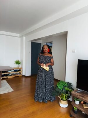 Black polka dot long dress with feminine off shoulder design